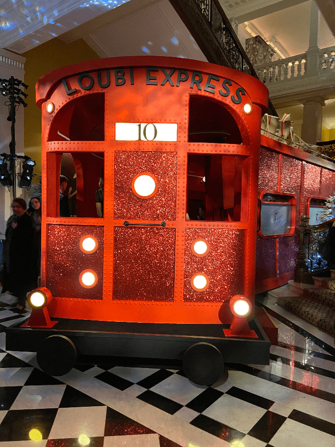 Sparkling Christmas train at Claridge Hotel