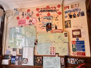 Signatures by members of the Ateez and Other K-Pop Idols at Little Korea London
