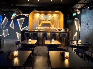 The Golden Bar Featuring a Giant Golden Controller at XP Tavern Gaming Bar London